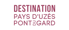 Logo de Destination Pays d’Uzès Pont du Gard, avec texte en rouge et un symbole circulaire "UP".